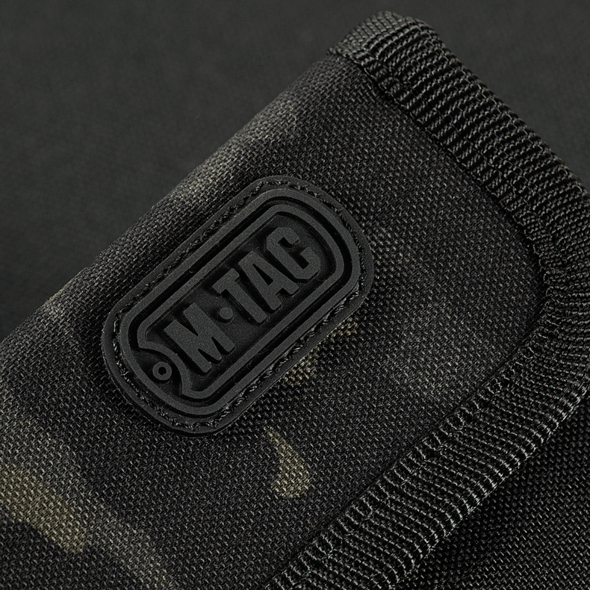 M-Tac Pung Elite Gen.II kestävästä Cordura-materiaalista, musta muotoilu M-Tac-logolla, sopii seteleille ja korteille. YKK-vetoketjut.