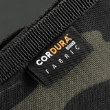 Lähikuva M-Tac Pung Elite Gen.II:stä, valmistettu kestävästä Cordura 500D-kankaasta, Cordura-merkki kankaassa.