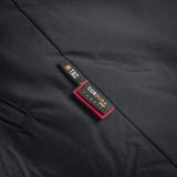 Lapussa M-Tac Alpha Gen.III Pro talvitakki, Cordura-yksityiskohtia mustassa kankaassa.