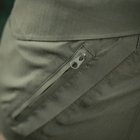Lähikuva M-Tac Aggressor Summer Flex Shorts -vetoketjusta käytännöllisessä taskussa. Fokusavainsana: M-Tac Aggressor Summer Flex Shorts.
