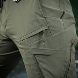 M-Tac Aggressor Summer Flex Shorts, käytännölliset taskut ja Flex Rip-Stop -kangas, täydelliset ulkoiluun ja taktiseen käyttöön.