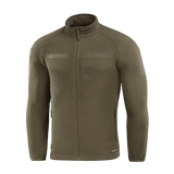 M-Tac Combat Fleece Polartec -takki oliivinvihreänä, tilavat taskut ja Velcro-kiinnitykset, täydellinen taktiseen ja arkikäyttöön.