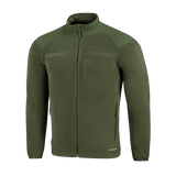 M-Tac Combat Fleece Polartec -takki oliivinvihreänä, Polartec-fleece ja YKK-vetoketjut, suunniteltu taktiseen ja arkipukeutumiseen.