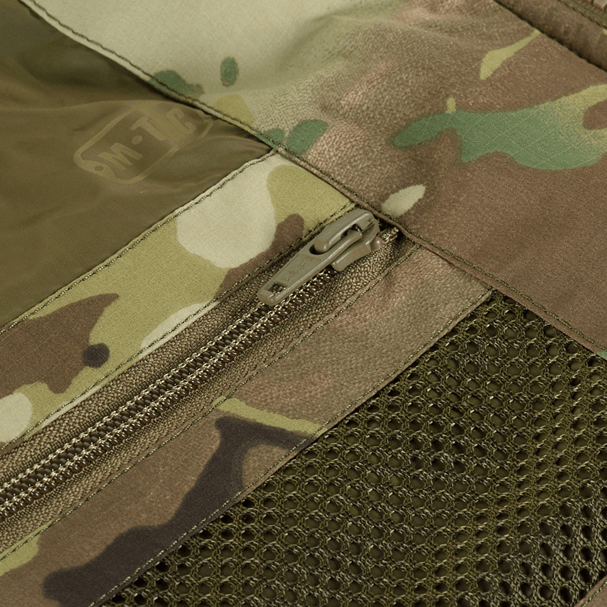 M-Tac Alpha Gen.IV Pro Primaloft -talvitakki Multicam-kuosissa, kestävä vetoketju ja vettähylkivä materiaali äärimmäisiin lämpötiloihin.