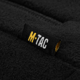 Lähikuva M-Tac Combat Fleece -takista Polartec Dame, fokus mustan Polartec-fleecen tekstuuriin, galleria-asento 1 tekninen yksityiskohta.