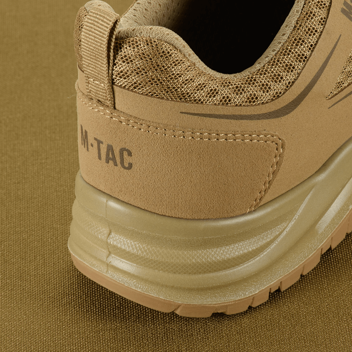 M-Tac Tactical Sneakers IVA beigenä, takapään yksityiskohta hengittävällä verkolla ja synteettisellä nubukilla, sopii kesäkäyttöön ja ulkoiluun.