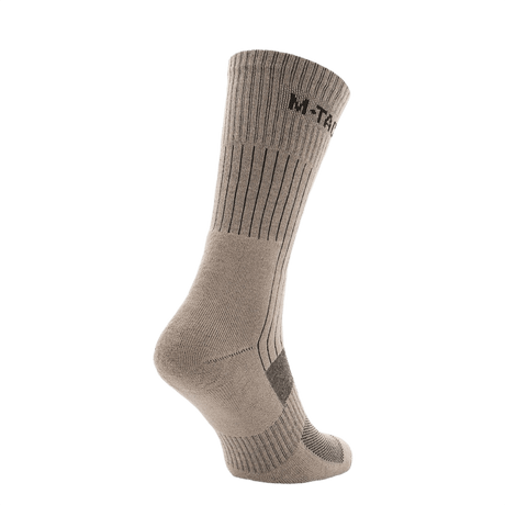 M-Tac Høje Sokker Mk.2 beige värissä termoalueilla ja iskunvaimennusalueilla maksimaaliseen mukavuuteen trekkingissä ja intensiivisessä käytössä.