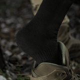 M-Tac Sokker Winter Wool kengissä, lämpimät talvisukat merinovillalla mukavuuteen ja lämpöön, sopivat päivittäiseen käyttöön kylminä kausina.