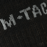 Lähikuva M-Tac Sokker Winter Wool -sukista, yksityiskohtainen neulos merinovillalla lämmöksi ja mukavuudeksi talvikaudella.
