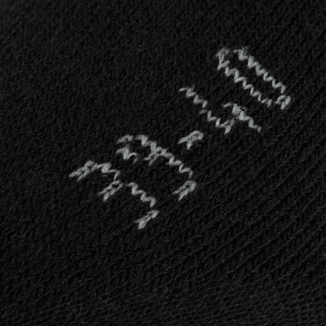 Lähikuva M-Tac Sokker Winter Wool mustana villana, harmaa merkintä; ihanteelliset lämmön ja mukavuuden tarjoamiseen kylmällä kaudella.