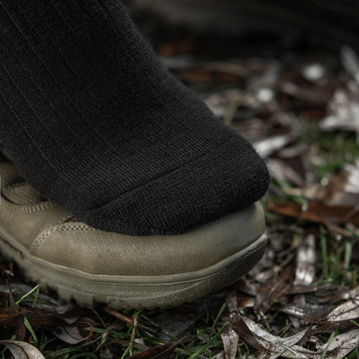 M-Tac Sokker Winter Wool talvisaappaan kanssa käytettynä, sopii kylmiin olosuhteisiin. Merinovilla tarjoaa lämpöä ja mukavuutta, liukumaton.