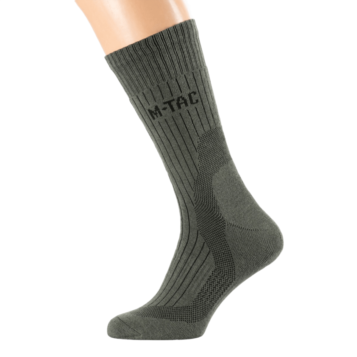 M-Tac Sokker Mid Calf Mk.4 mallissa, suunniteltu vaellukseen lämpövyöhykkeillä ja jalkaholvin tuella optimaaliseen mukavuuteen ja suojaan