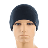 M-Tac Fleece Watch Cap Light Polartec mallipäähän asetettuna, talvihattu Polartec-fleecestä, musta, suojaa kylmältä ja tuulelta.