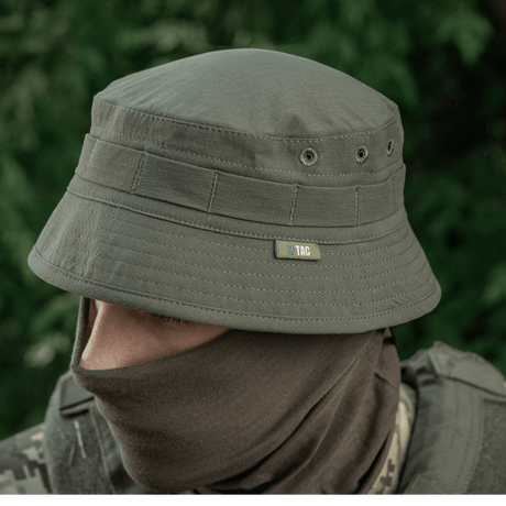 M-Tac Panamahat Gen. II Summer Flex oliivinvihreä nylon/elastaani, NIJ-sertifiointi, näytetty henkilöllä kasvosuojauksella, galleria-asento 1.