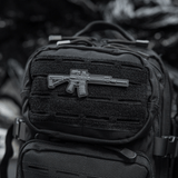 M-Tac AR-15 3D PVC-patch repussa, taktinen moraalitarra Velcro-kiinnityksellä, kestävä ulkokäyttöön ja sotilaskäyttöön.