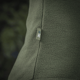 M-Tac Delta Polartec fleece-takki vihreänä, tekstuurin yksityiskohta, valmistettu kestävästä Polartec® Micro Series -fleecestä, kevyt ja hengittävä.