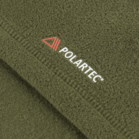 Lähikuva M-Tac Delta Polartec -naisten fleecetakista, Polartec®-logo vihreällä fleecellä.