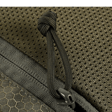 M-Tac Konvert Taske Elite yksityiskohta robustista Cordura-materiaalista ja lynlåsista, lähikuva.