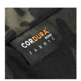 Lähikuva M-Tac Konvert Taske Elite -laukusta, jossa Cordura 500D ja Cordura Hex 1000D, näkyy materiaalimerkintätarra.