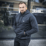 Mies M-Tac Cotton Raglan -hupparissa, mukava ja monikäyttöinen, sopii arkeen ja aktiiviseen elämäntapaan, raglanhihoilla.