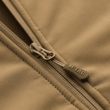 Lähikuva vetoketjudetaljista M-Tac Soft Shell Jakke med Linerissä, joka näyttää takin kestävän rakenteen ja muotoilun.