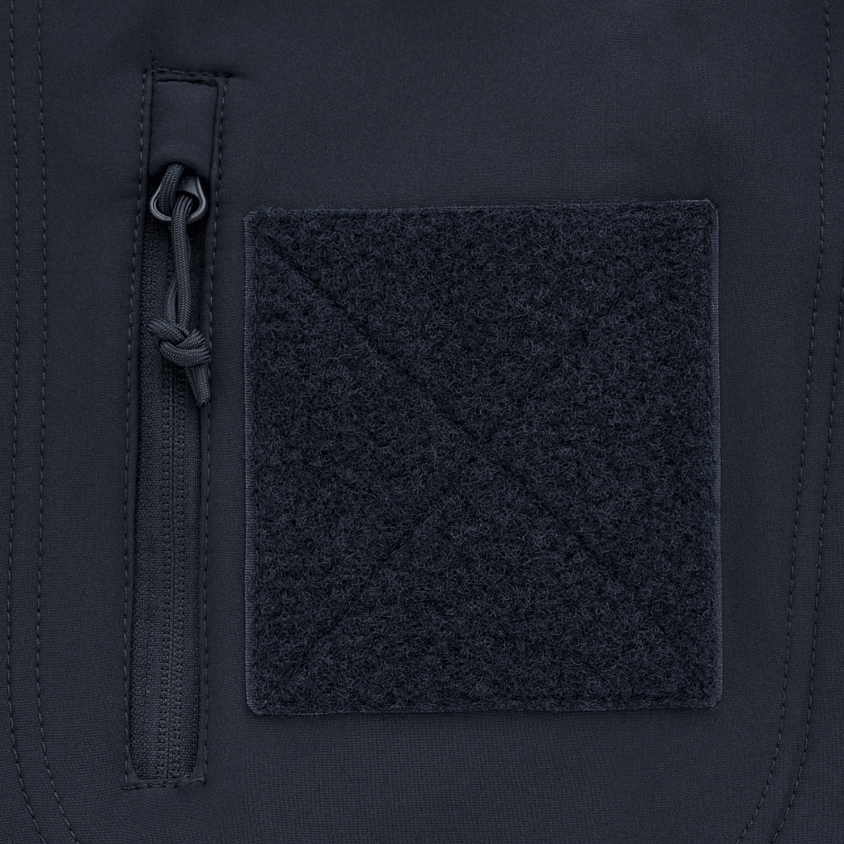 Yksityiskohta M-Tac Soft Shell Jakke med Lineristä, näyttää vetoketjun ja fleec-paneelin.