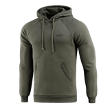 M-Tac Cotton Raglan Hard Hoodie vihreänä kengurutaskulla ja hupulla, suunniteltu arki- ja vapaa-ajan käyttöön.