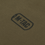 M-Tac Cotton Raglan Hard Hoodie 100% puuvillaa fleece-vuorella – lähikuva kankaasta ja M-Tac-logosta. Sopii syksyyn, talveen ja kevääseen.