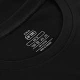 Musta M-Tac Cotton HARD T-paita heijastavalla logolla ja litteillä saumoilla mukavuutta varten. 100% puuvilla, oversize-leikkaus vapaaseen liikkumiseen. "Made in Ukraine" -etiketti.