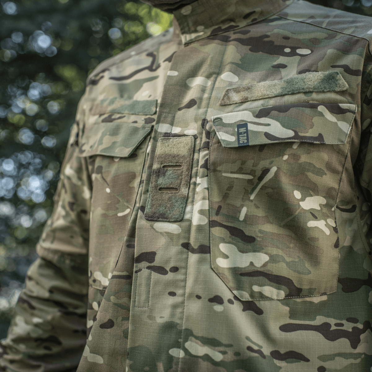 M-Tac-takki Sturm Gen.II NYCO Extreme Multicam NIR-teknologialla, suunniteltu taktiseen käyttöön ja ulkoiluun.