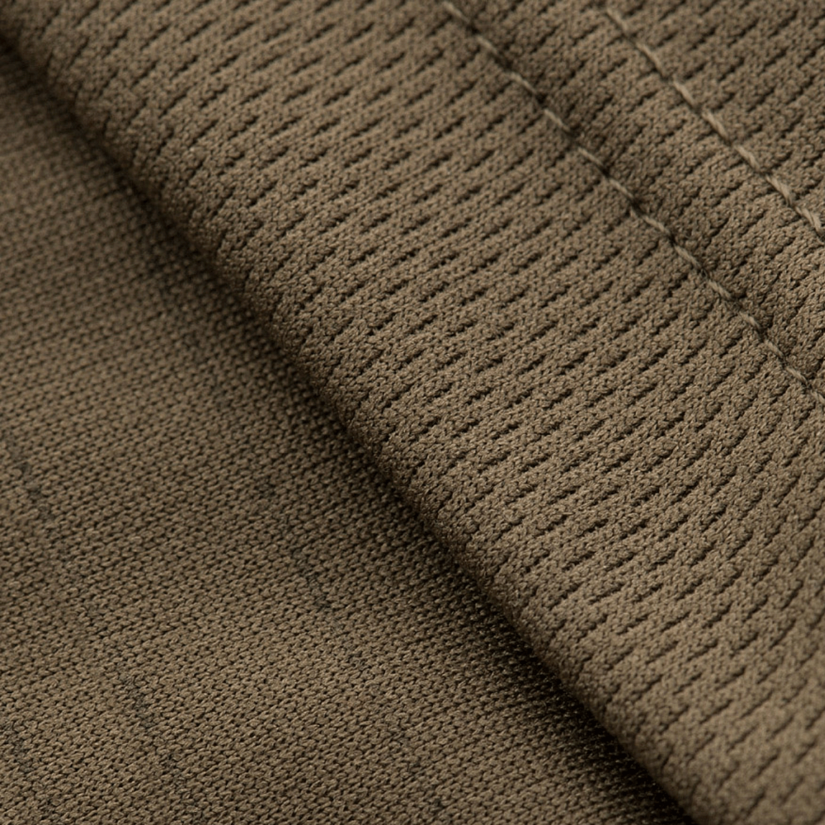 Lähikuva M-Tac Sweating Ninja-Balaclavan kankaasta, valmistettu 100% polyester, kosteutta siirtävä ominaisuus