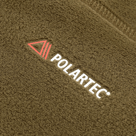 M-Tac Polartec Anatomic Tube Scarf valmistettu kestävästä Polartec® Micro Series -fleecestä, esittelee merkin logon lämpimässä materiaalissa.