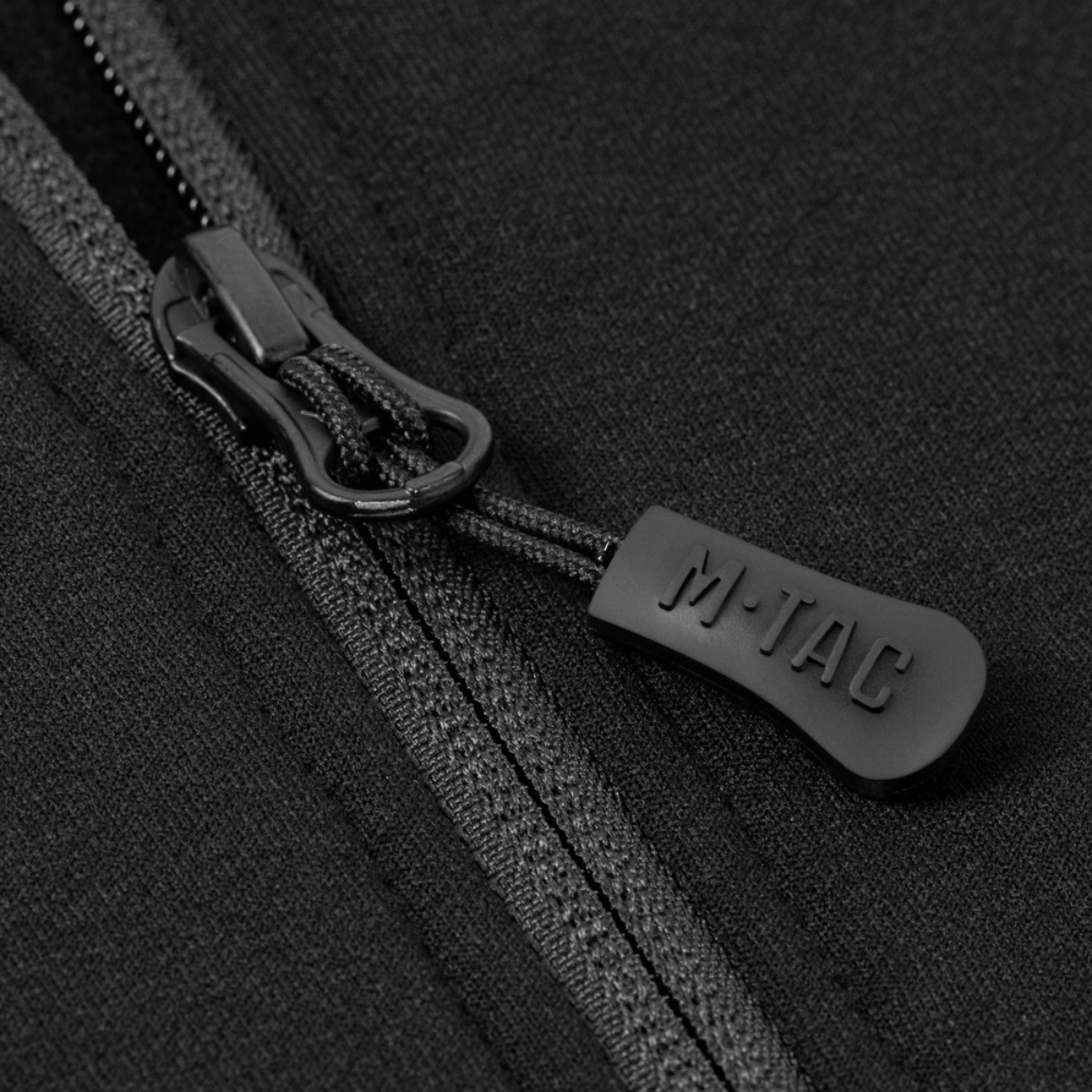 M-Tac Shadow Polartec Fleece -hupparin vetoketjun yksityiskohta.