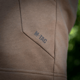 M-Tac Shorts Sport Fit Cotton hengittävästä 100% puuvillasta ja hillityllä logolla, suunniteltu kesäurheiluun ja päivittäiskäyttöön.