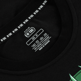 Lähikuva M-Tac T-Shirt Night Vision -etiketistä mustalla, puuvillasekoite mainittu, selkeät pesuohjeet ja koko XS.