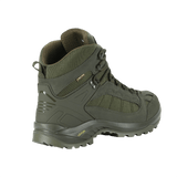 M-Tac Taktiske Demi-Season Støvler Pro Line vihreänä, kulutusta kestävällä suede- ja Cordura-päällisellä sekä patentoidulla Vibram-pohjalla.