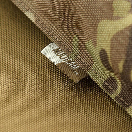 M-Tac Bundeswehr-makuualustan laukku vankasta maastokuvioidusta materiaalista, korostettu kestävyys, galleria-asento 1.