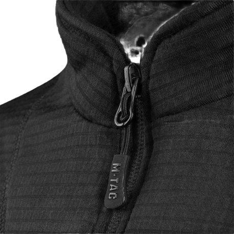 Lähikuva M-Tac Thermal Fleece Trøje Delta Level 2:sta YKK-vetoketjulla, suunniteltu kylmään ja karuun ilmastoon.