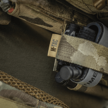 M‑Tac Tourniquet Pouch Elastic Gen.5 kiinnitetty taktiseen varustukseen, Cordura 500D, nopea pääsy vasemmalta tai oikealta.