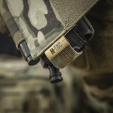 M‑Tac Tourniquet Pouch Elastic Gen.5 Cordura 500D:ssä asennettuna taktiseen varustukseen, korostaa nopean pääsyn ominaisuuksia.