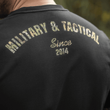 M-Tac T-Shirt Logo, "Military & Tactical Since 2014" -camoprint selässä, symboloi brändin taktista perintöä.