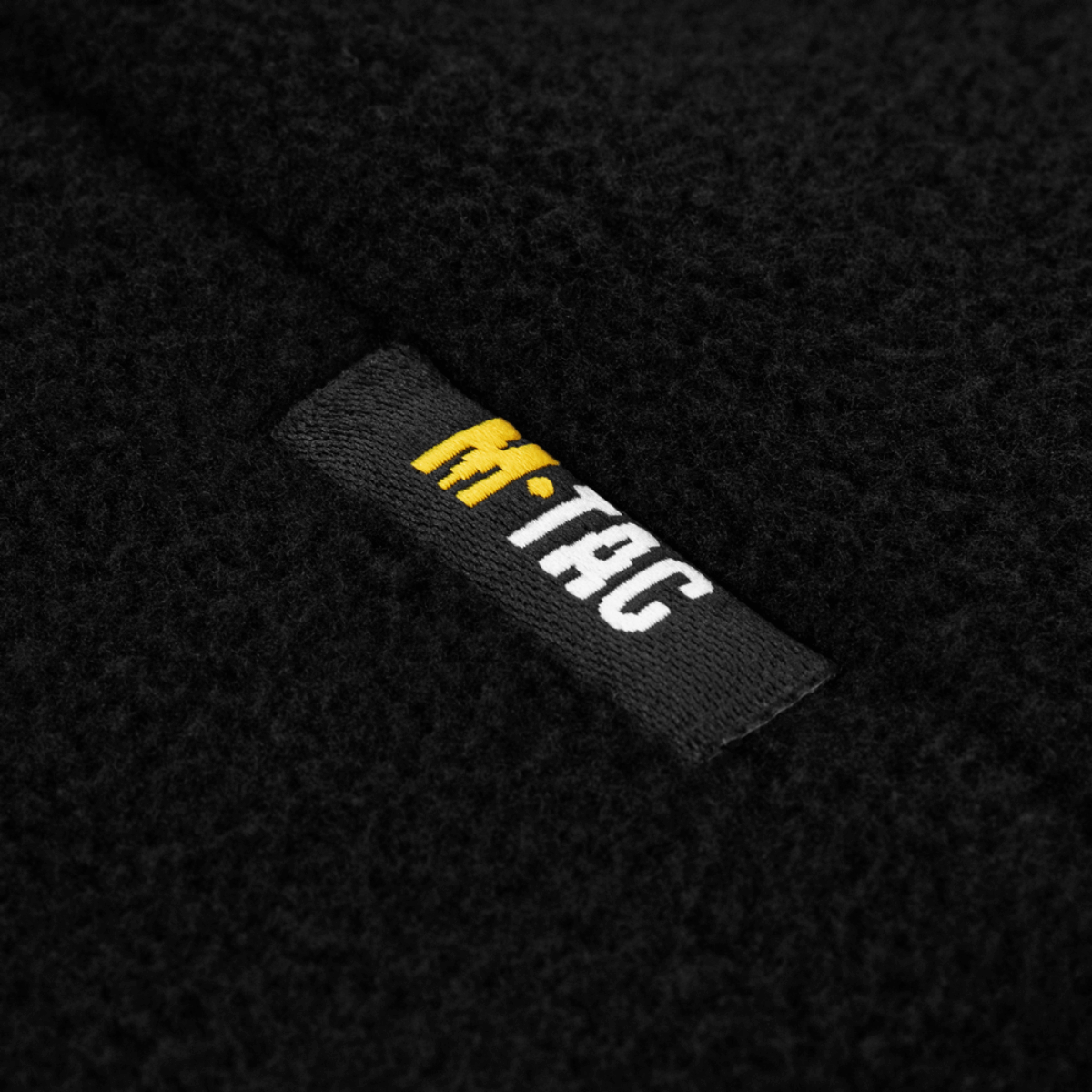 Lähikuva merkistä M-Tac Watch Cap Elite Fleece Beanie Hat Slimtexissä, kulutuskestävä fleece ja Slimtex-lämpökerros