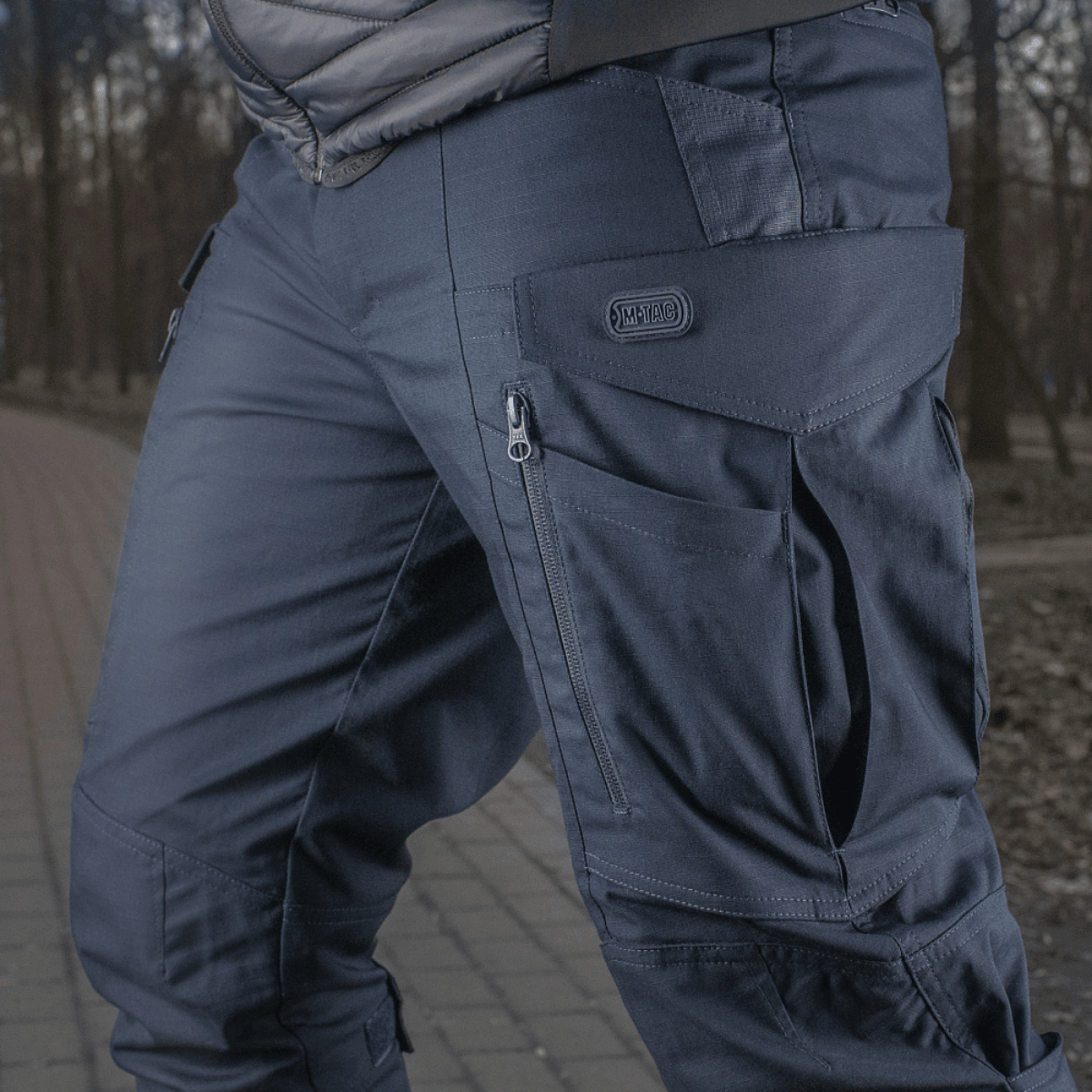 M-tac taktiset housut Conquistador Gen. I Flex ulkoiluun, valmistettu repäisynkestävästä polycotton Rip-stop Flex -kankaasta