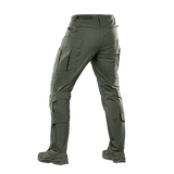 M-tac taktiset housut Conquistador Gen. I Flex vihreänä polycotton Rip-stop Flex -materiaalista retkeilyyn ja ulkoaktiviteetteihin.