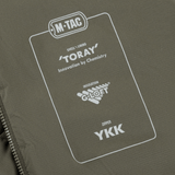 M-Tac Jarl -takin materiaalitiedot: Toray, G-Loft ja YKK-vetoketju maksimaaliseen lämpöön ja mukavuuteen.