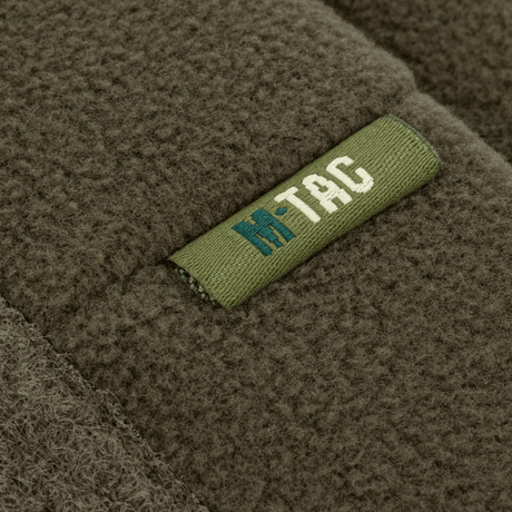 M-Tac Watch Cap Elite Fleece Beanie Hat Velcro, vihreä fleece Velcro-paneelilla merkeille, ihanteellinen kylmään säähän ja taktisiin aktiviteetteihin.