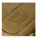 Lähikuva M-Tac Buckler Taske Elite Hexistä Hex-Cordura-materiaalissa, M-TAC-logo ja tekstuuri näkyvissä.