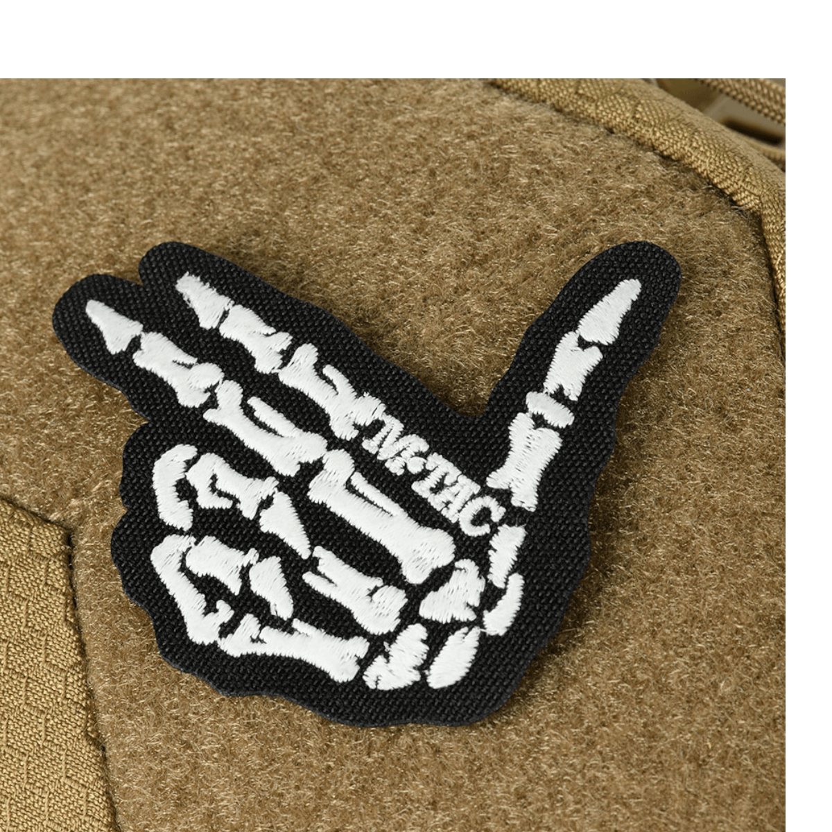 M-Tac Buckler Taske Elite Hex, runkomallinen kahvasuunnittelu Hex-Cordura-pinnalla, musta ja ruskea väriyhdistelmä.